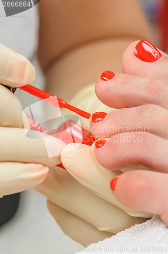 Image of pedicure process macro closeup