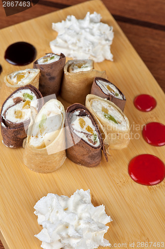 Image of pancake roll with marmalade