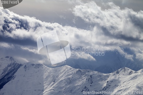 Image of Evening mountains and cloudy sky