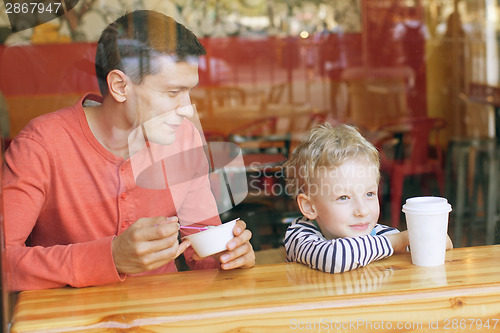 Image of family in cafe