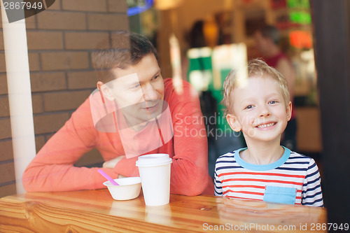 Image of family in cafe