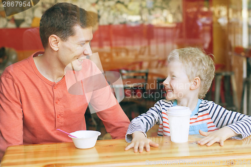 Image of family in cafe