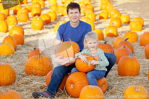 Image of family at pumpkin patch