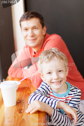 Image of family in cafe