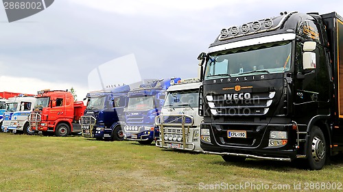 Image of Row of Show Trucks at a Truck Meeting