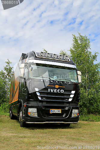 Image of Black Iveco Stralis 450 Trailer Truck