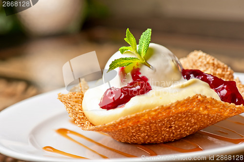 Image of cake with jam ice cream