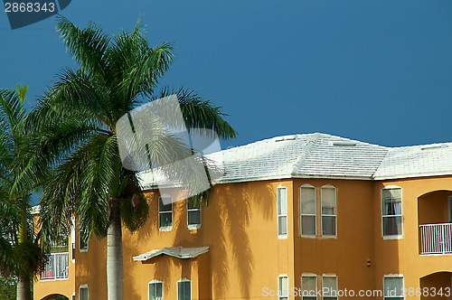 Image of white roof on orange building