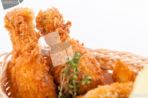 Image of Crisp crunchy golden chicken legs and wings