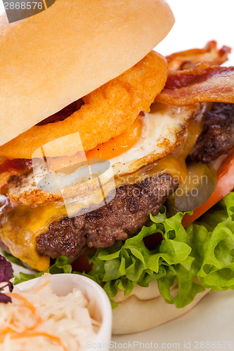 Image of Delicious egg and bacon cheeseburger