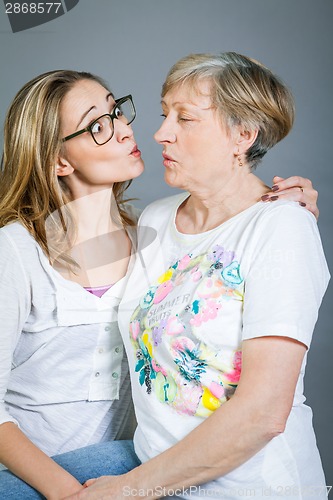 Image of Loving grandmother and granddaughter