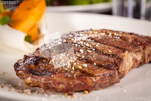 Image of Grilled beef steak with seasoning