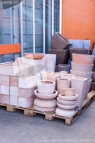 Image of Glazed and unglazed ceramic flower pots