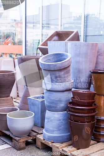 Image of Glazed and unglazed ceramic flower pots