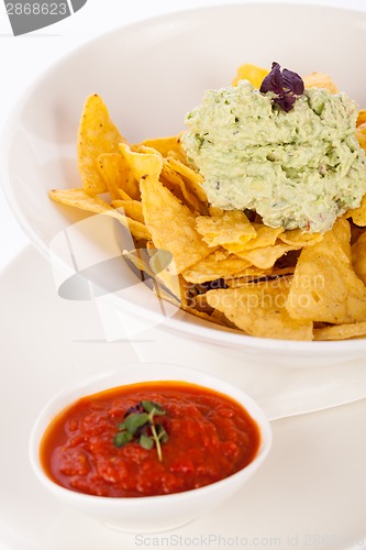 Image of Crisp corn nachos with guacamole sauce