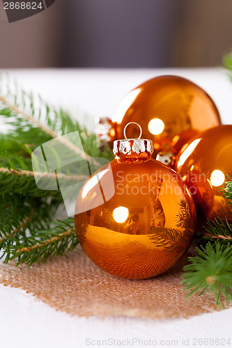 Image of Shiny bright copper colored Christmas balls