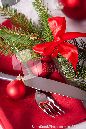 Image of Red themed Christmas place setting