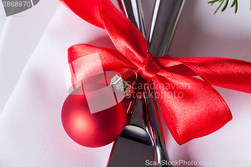 Image of Romantic red Christmas table setting