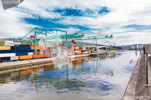 Image of Shipyard with containers and cranes