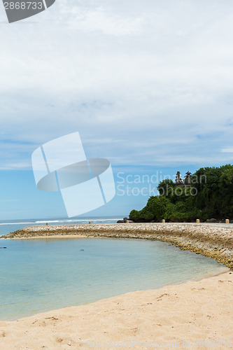 Image of Beautiful tropical beach with lush vegetation