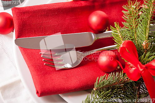 Image of Red themed Christmas place setting