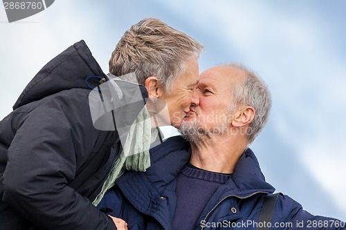 Image of Elderly couple taking a self portrait