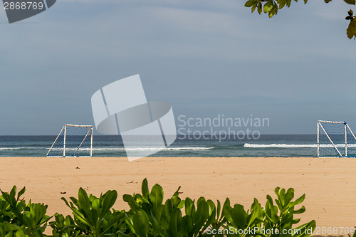 Image of Beautiful tropical beach with lush vegetation