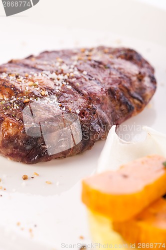 Image of Grilled beef steak with seasoning