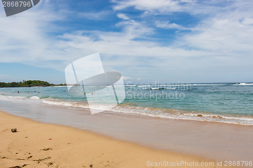 Image of Beautiful tropical beach with lush vegetation