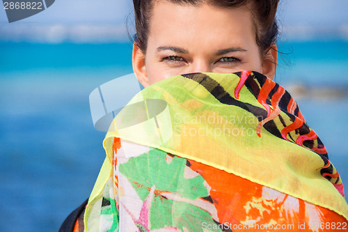 Image of Beautiful vivacious woman at the seaside