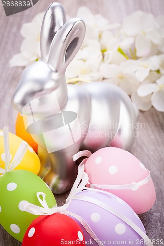 Image of Easter still life with a silver bunny and eggs