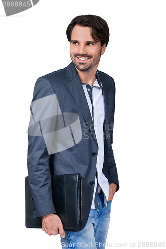 Image of Handsome stylish man carrying a briefcase