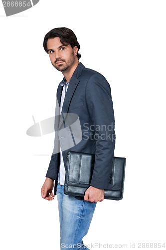 Image of Handsome stylish man carrying a briefcase