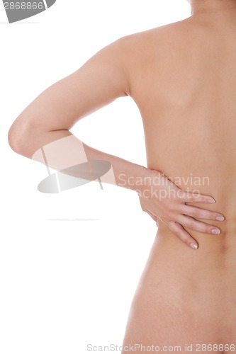 Image of Woman caressing her bare shoulder and back