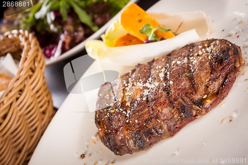 Image of Grilled beef steak with seasoning