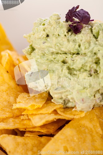 Image of Crisp corn nachos with guacamole sauce