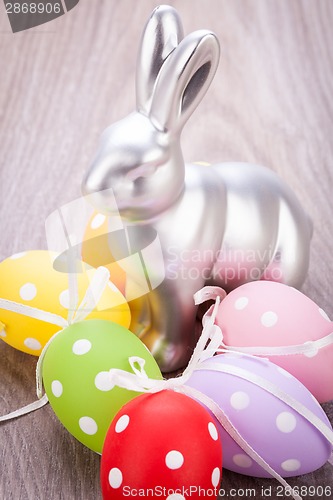 Image of Easter still life with a silver bunny and eggs