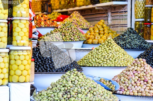 Image of Olives and pickles on display at a farmers market