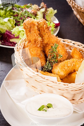 Image of Crisp crunchy golden chicken legs and wings