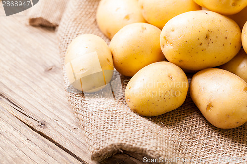 Image of Farm fresh  potatoes on a hessian sack