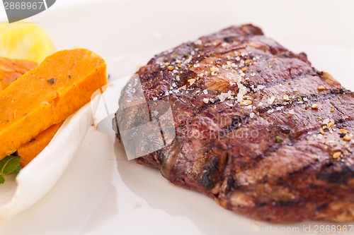 Image of Grilled beef steak with seasoning