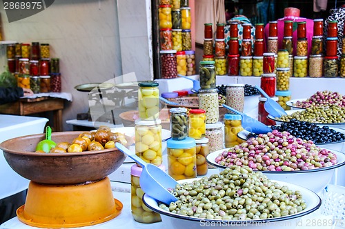 Image of Olives and pickles on display at a farmers market