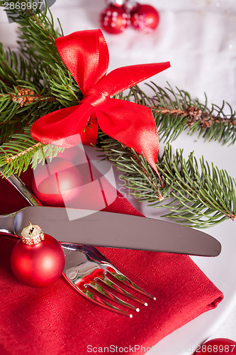 Image of Red themed Christmas place setting