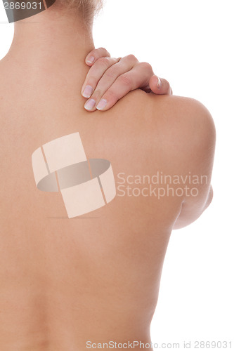 Image of Woman caressing her bare shoulder and back