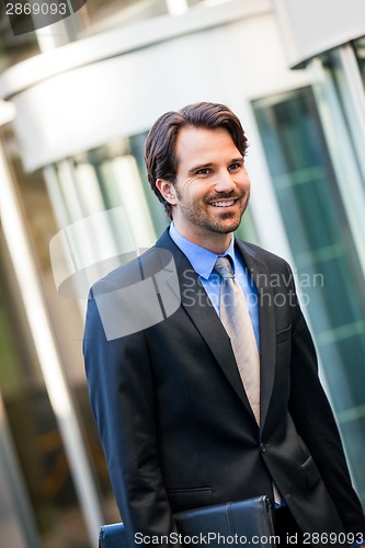 Image of Businessman standing waiting for someone