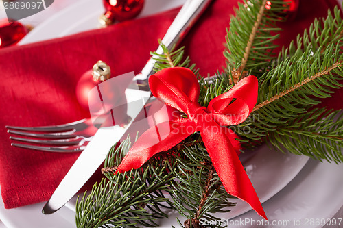 Image of Red themed Christmas place setting