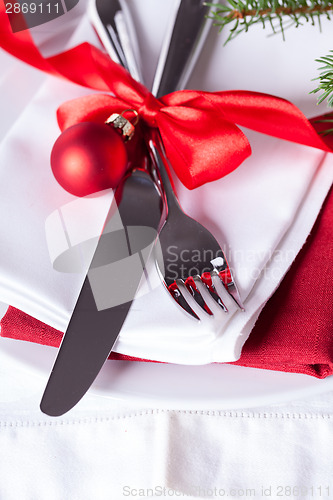 Image of Romantic red Christmas table setting