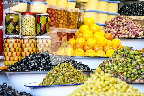 Image of Olives and pickles on display at a farmers market