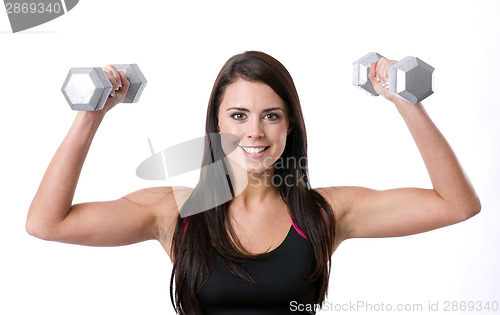 Image of Brunette and Barbells Working out in White Walles Gym