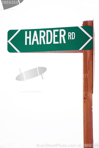 Image of Harder Road Street Sign in Snow Storm Rural Highway